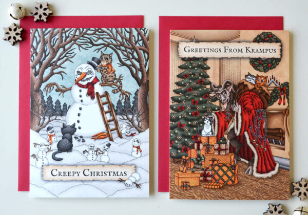 Griezelige Kerstkaarten Set x 6 Zes Monster en Katten Wenskaarten Krampus Enge Sneeuwman Gothic Kerstmis Poezen Illustraties Spooky Folklore Kerstkaart Creepy Christmas Felicitatie Feestdagen Kaart